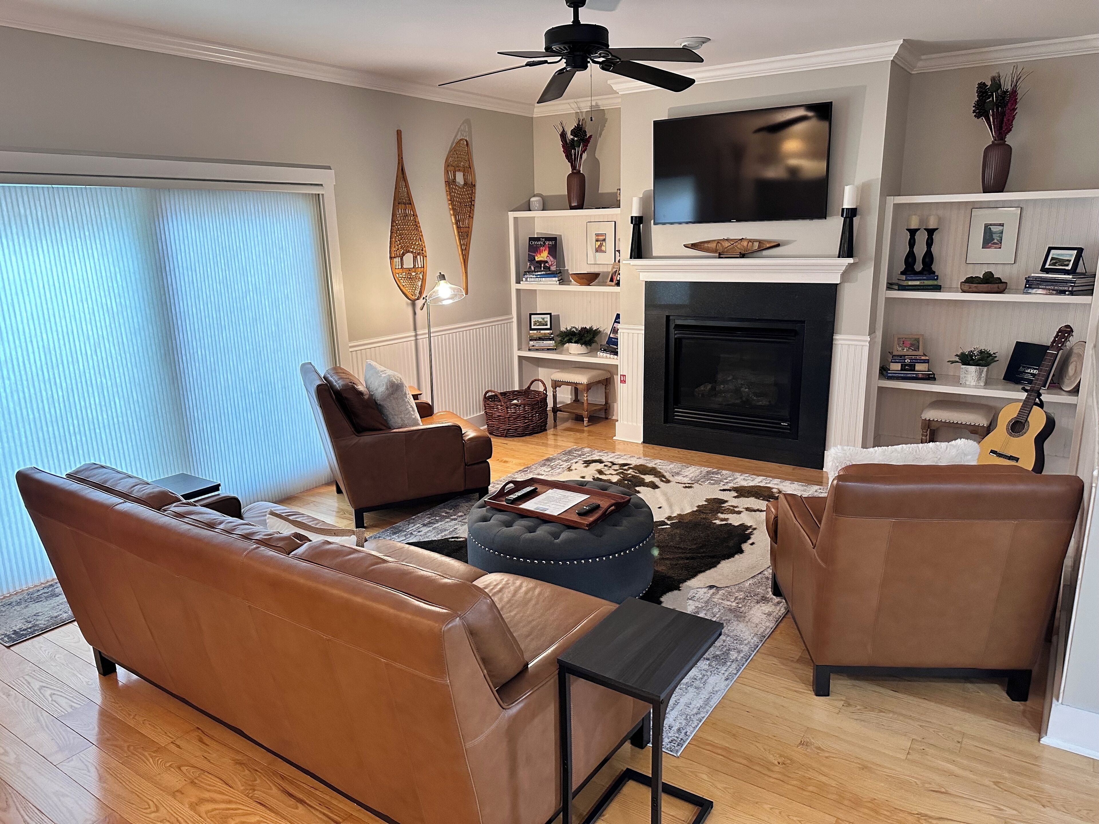 Smart TV, fireplace, table football, books