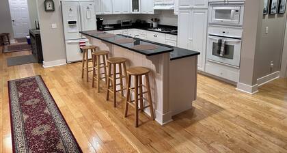 Walk to Everything! Spacious & New 4-Bedroom Home in the Center of Town.