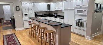Walk to Everything! Spacious & New 4-Bedroom Home in the Center of Town.