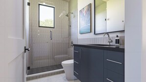 A modern bathroom with a shower, toilet, and vanity. - Experience Elegance at the Montclair in Our Luxury Villa (Springdale)