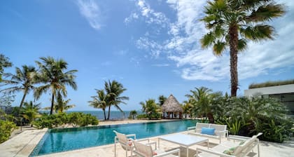Upscale 5-bed Beachfront Villa w/ pool , pier & ocean front
