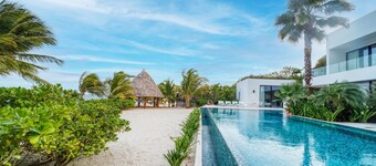 Upscale 5-bed Beachfront Villa w/ pool , pier & ocean front