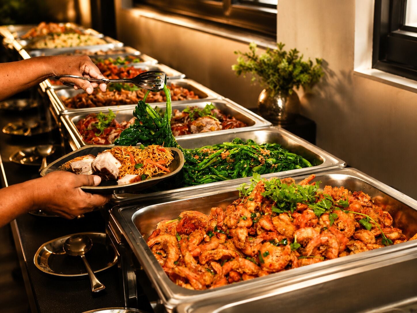 A buffet with various dishes including seafood, vegetables, and noodles.