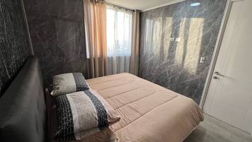 1 habitación, tabla de planchar con plancha, wifi y ropa de cama