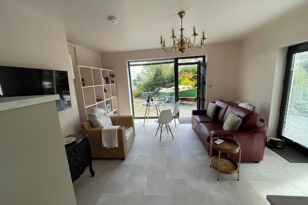 Living room and kitchen with views eastward over Lough Corrib