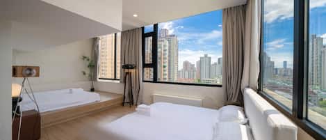 Superior Room, Multiple Beds, City View | Laptop workspace, free WiFi