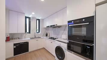 Superior Room, Multiple Beds, City View | Private kitchen | Fridge, stovetop, cookware/dishes/utensils