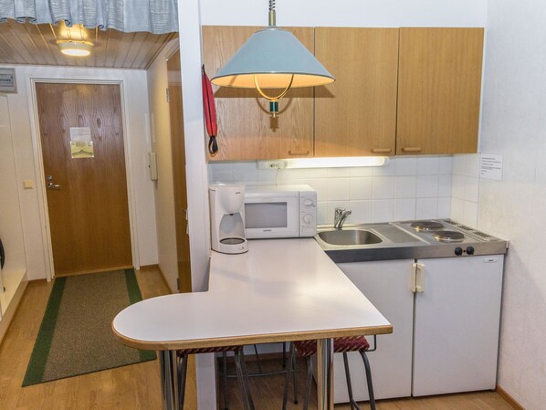 Fridge, microwave, cookware/dishes/utensils