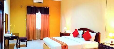 Habitación Deluxe | Escritorio, wifi gratis y ropa de cama