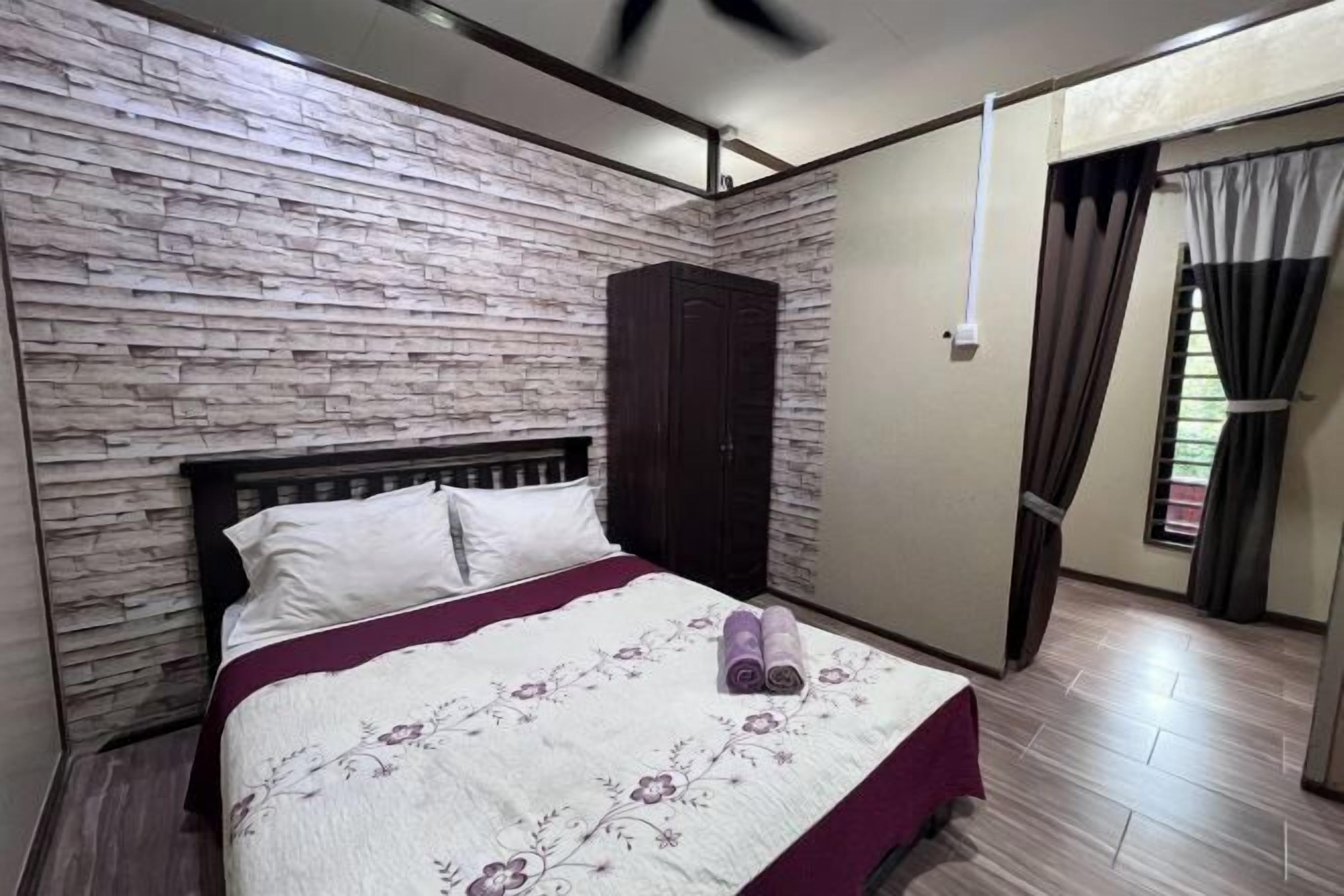 Desk, iron/ironing board, bed sheets