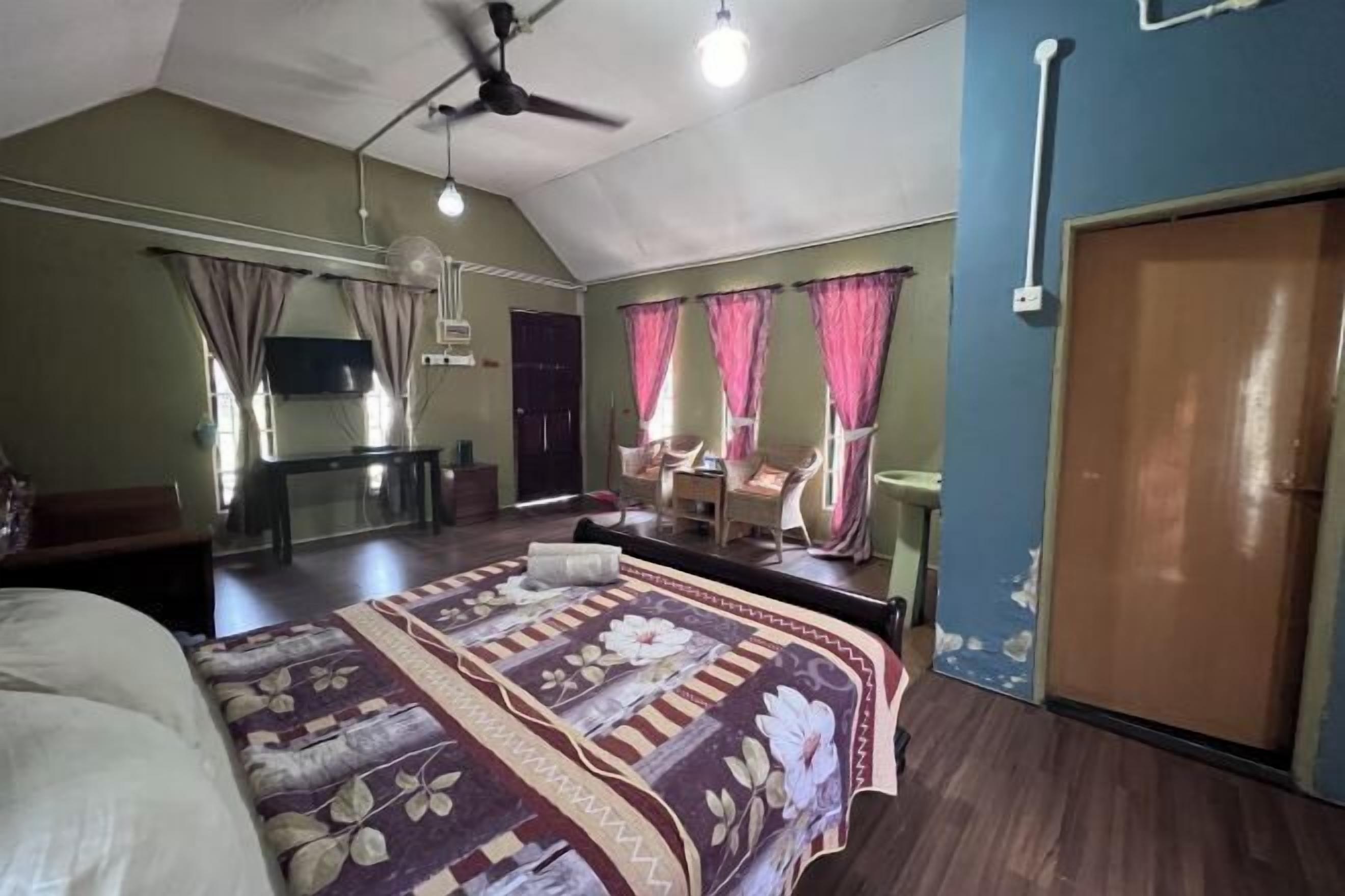 Desk, iron/ironing board, bed sheets