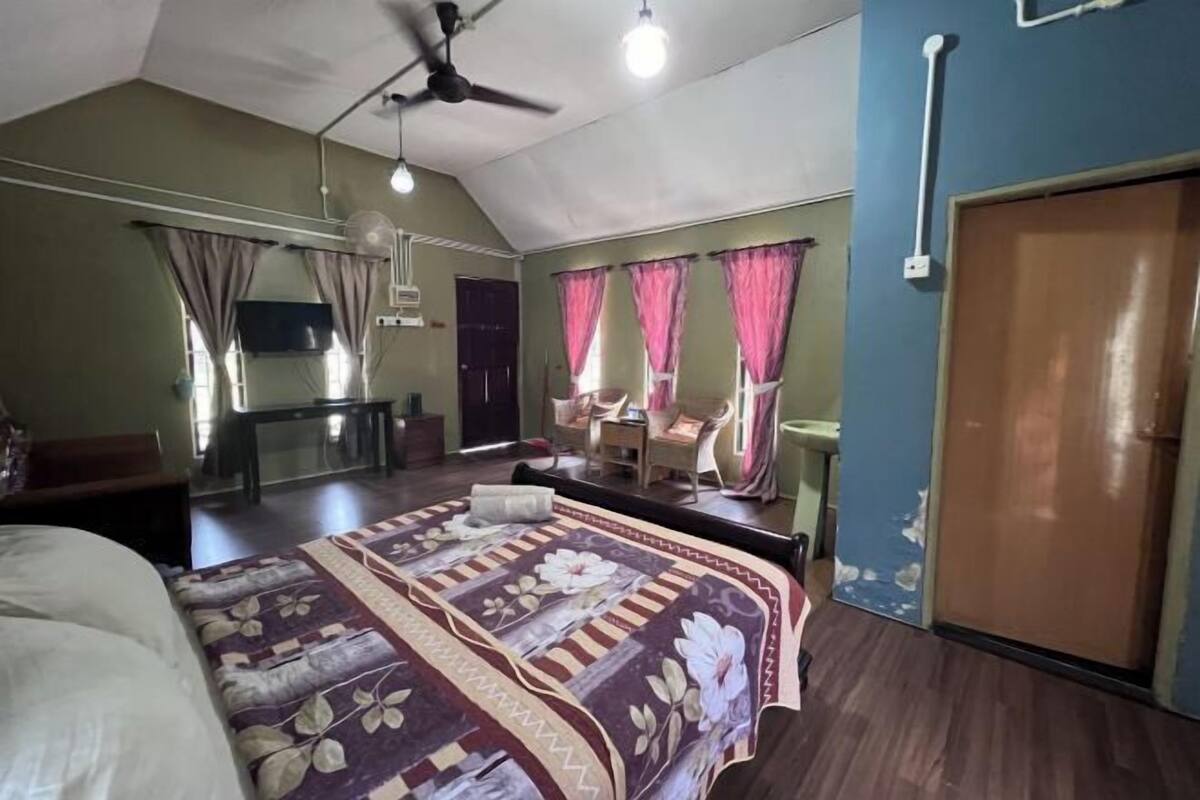 Desk, iron/ironing board, bed sheets