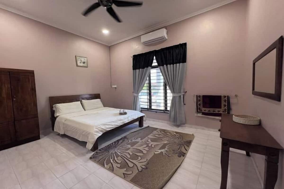 Desk, iron/ironing board, bed sheets