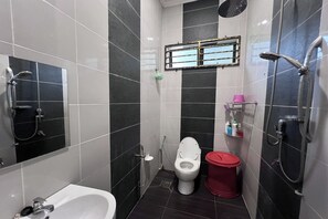 A bathroom with a toilet, bidet, and shower. - Nurbayu Villa (3 and 4 bedroom Villa) Kemaman (Chukai)