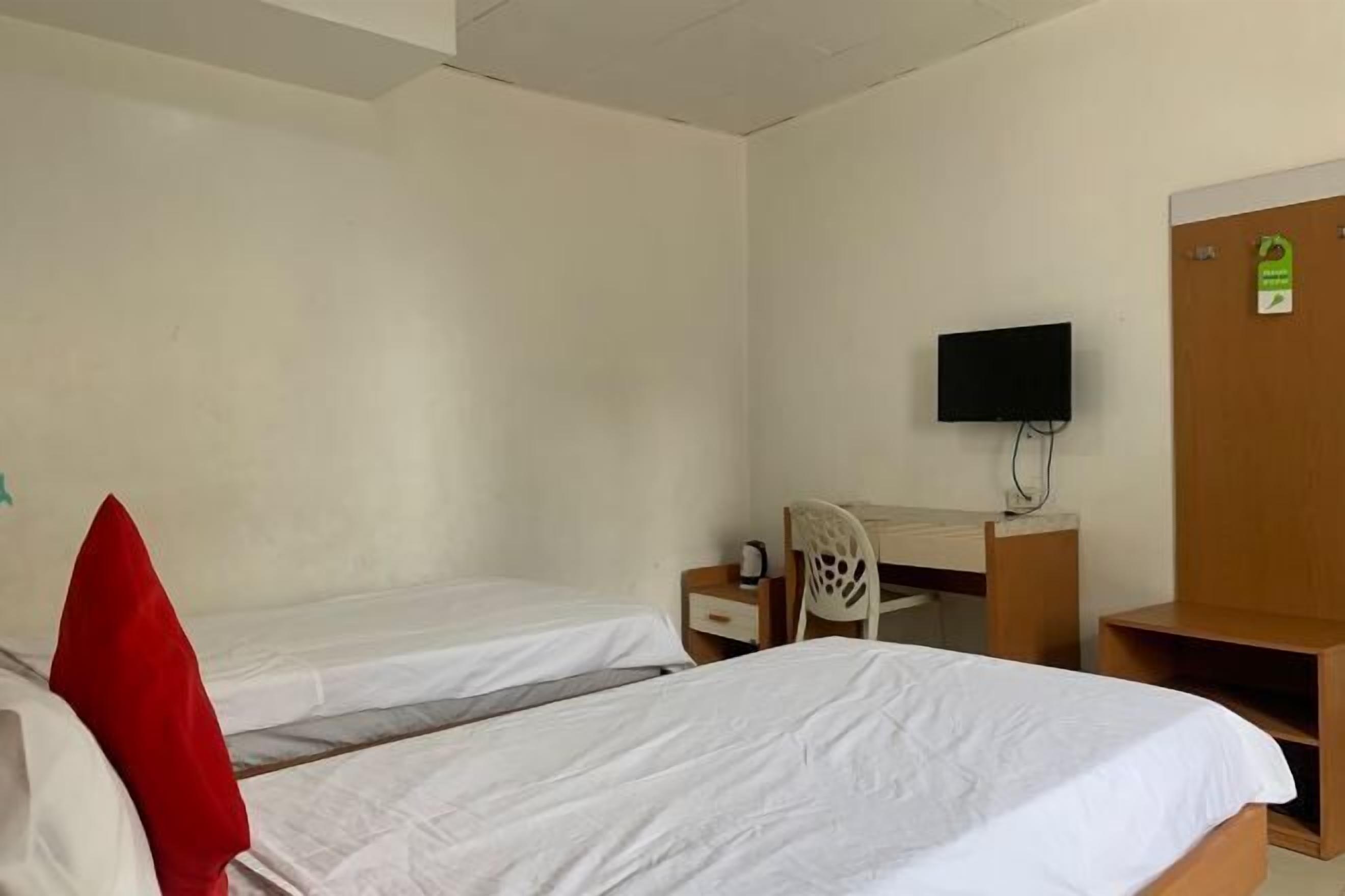 Escritorio, wifi gratis, ropa de cama y acceso para silla de ruedas 