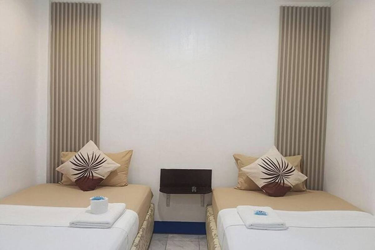 Desk, iron/ironing board, WiFi (free), bed sheets
