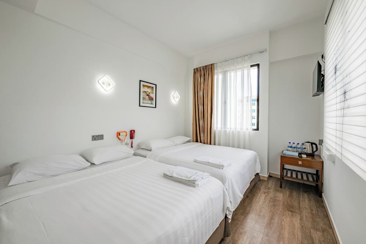 Deluxe Quadruple Room | Desk, free WiFi, bed sheets