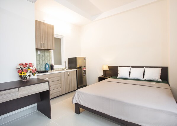 Premium bedding, memory-foam beds, desk, laptop workspace