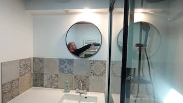 Shower, hair dryer, towels, toilet paper