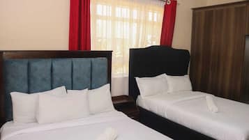 4 dormitorios, tabla de planchar con plancha, wifi gratis y ropa de cama