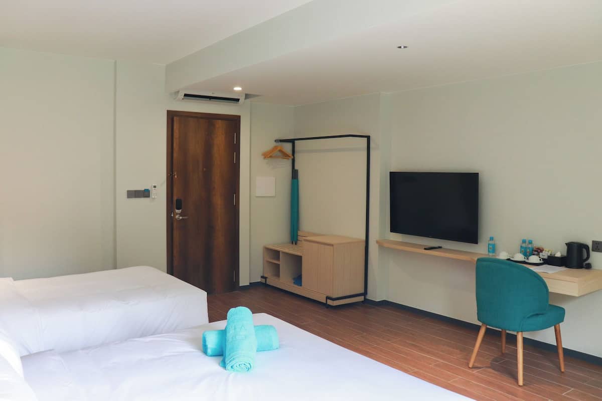 Üç Kişilik Oda, Balkon, Bahçe Manzaralı | 1 yatak odası, güneşlik/perde, ses yalıtımı, ücretsiz kablosuz İnternet