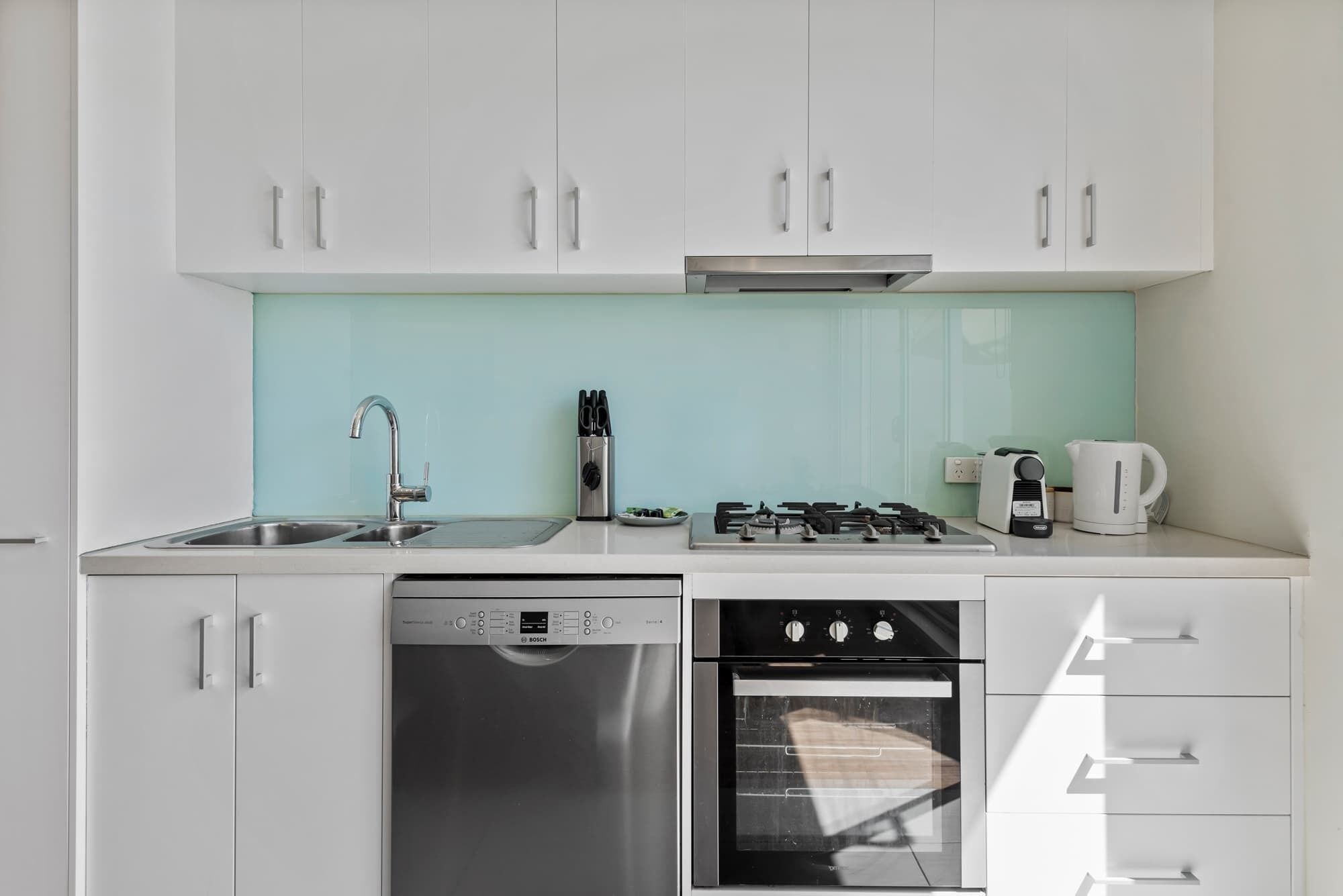 Coffee/tea maker, fridge, microwave, oven