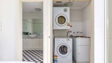 Shower, hair dryer, towels, shampoo