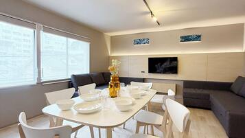 Superior Apartment, Non Smoking | Living area | 55-inch Smart TV with digital channels