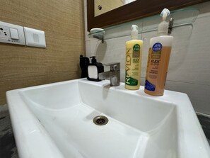 Shower, towels, toilet paper
