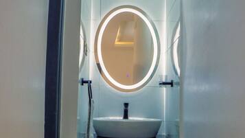 Shower, towels, soap, toilet paper