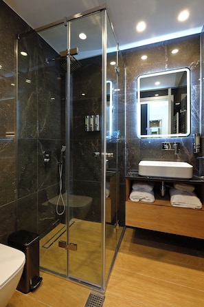 Hair dryer, towels, soap, shampoo