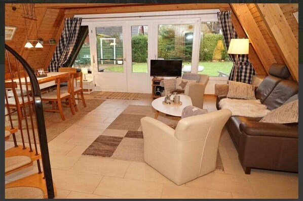 Smart TV, fireplace, books, stereo