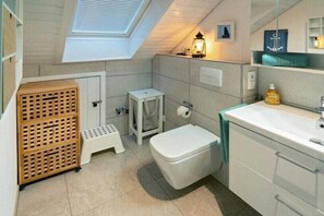 Douche, sèche-cheveux