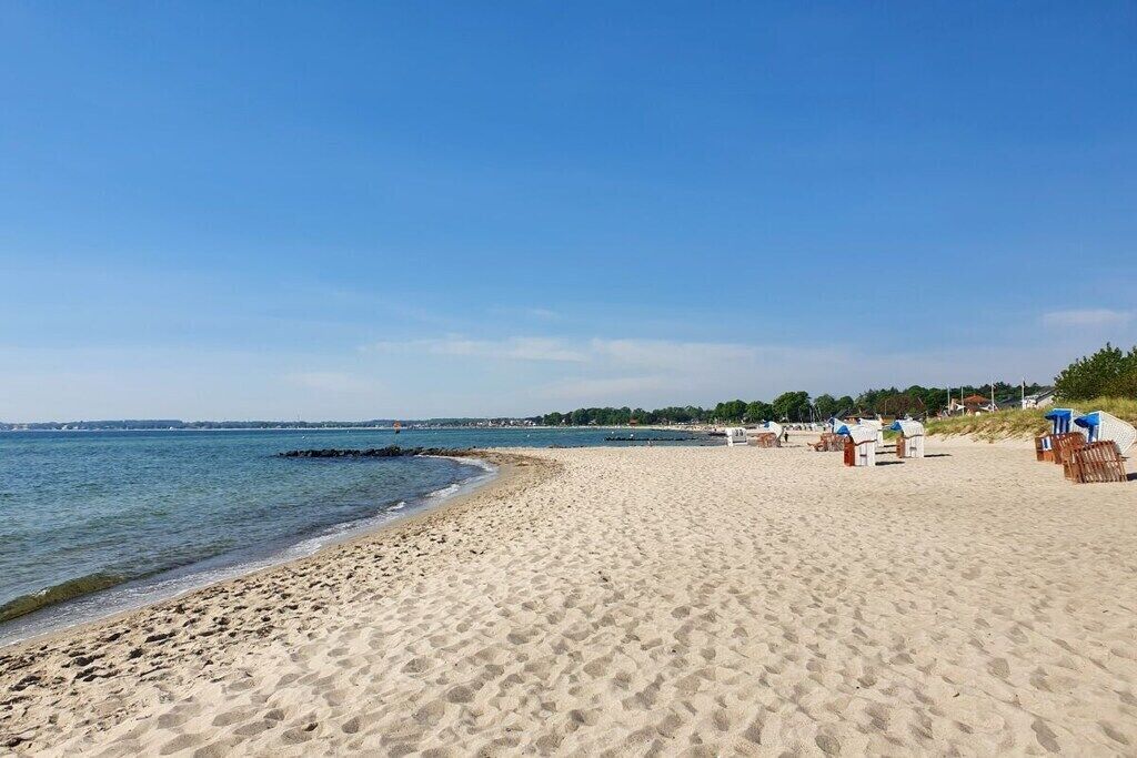 On the beach, sun loungers
