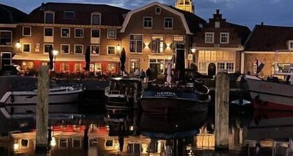 Lever du soleil avec cuisine ouverte sur l'IJsselmeer