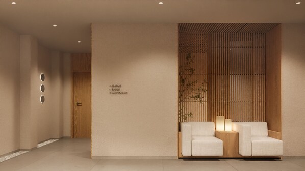 Un área de recepción moderna con un revestimiento de listones de madera, un mostrador de recepción y tres lámparas circulares en la pared.