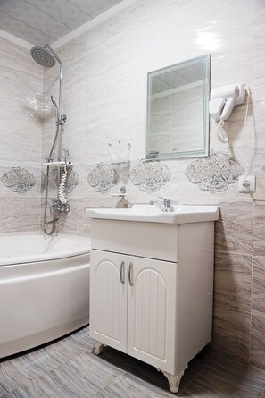 Quadruple Room, Lanai, City View | Bathroom | Hair dryer, slippers, towels, soap - Durdona Guest House (Samarkand)