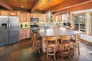 Fridge, microwave, oven, stovetop - Koda Bear Lodge By Destination Big Bear: Cozy 3 Bedroom Modern Craftsman Cabin! Foosball Table! Hot Tub! Pet Friendly! Walk To Bear Mountain & Golf Course! (Big Bear Lake)