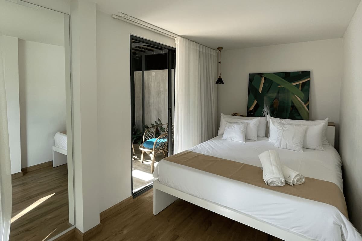 Family Suite, Non Smoking | In-room safe, blackout drapes, soundproofing, iron/ironing board