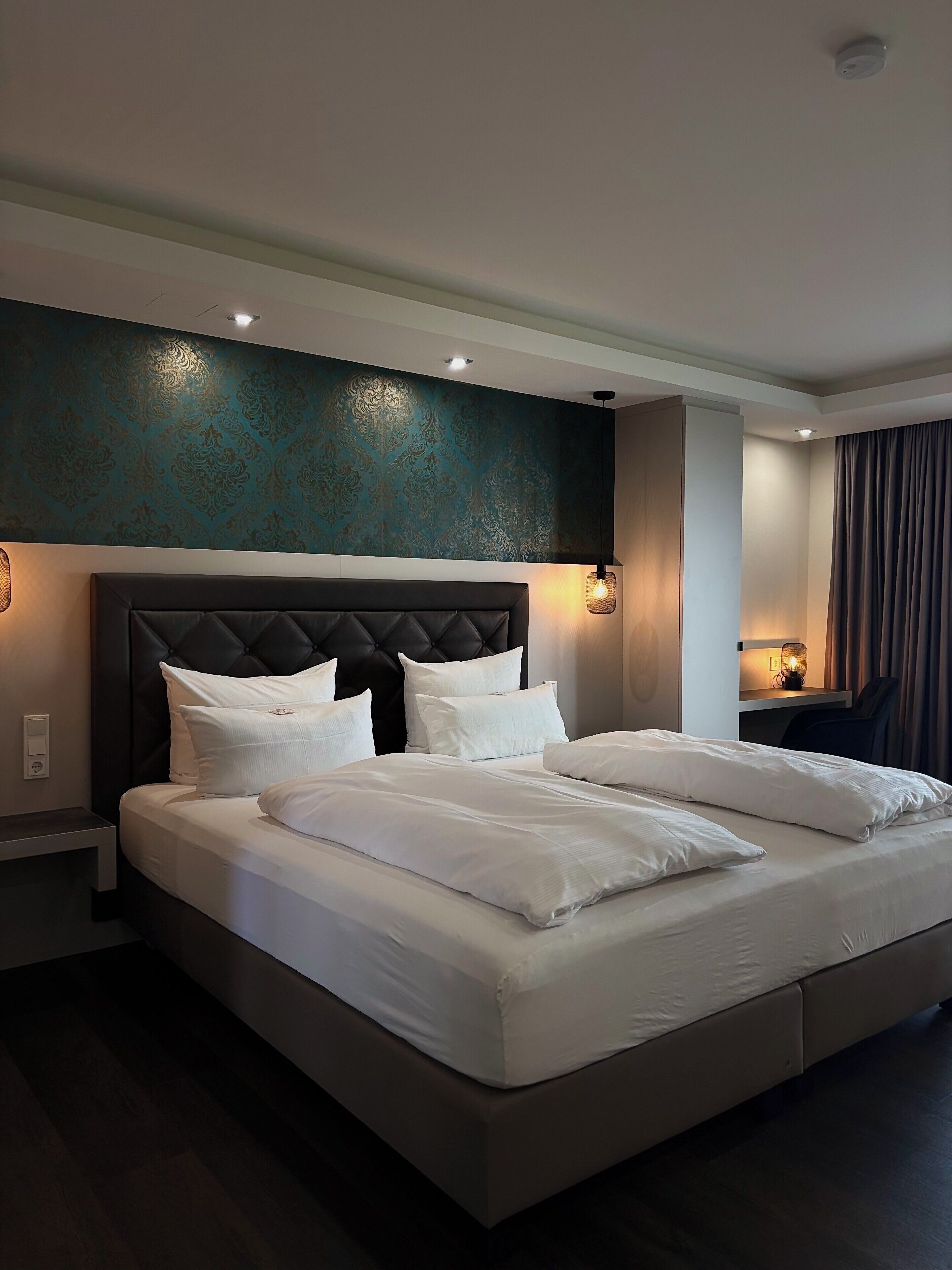 Hypo-allergenic bedding, minibar, in-room safe, desk