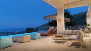 Outdoor pool, pool umbrellas, pool loungers