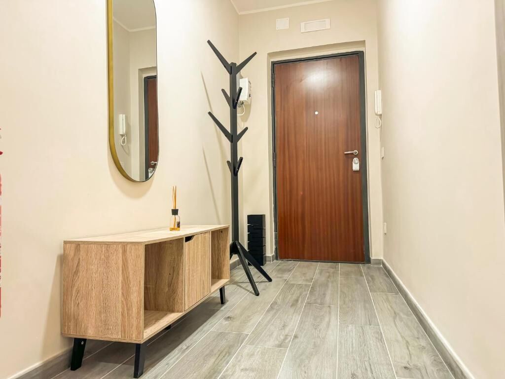 Appartamento, balcone | Area soggiorno | TV a schermo piatto