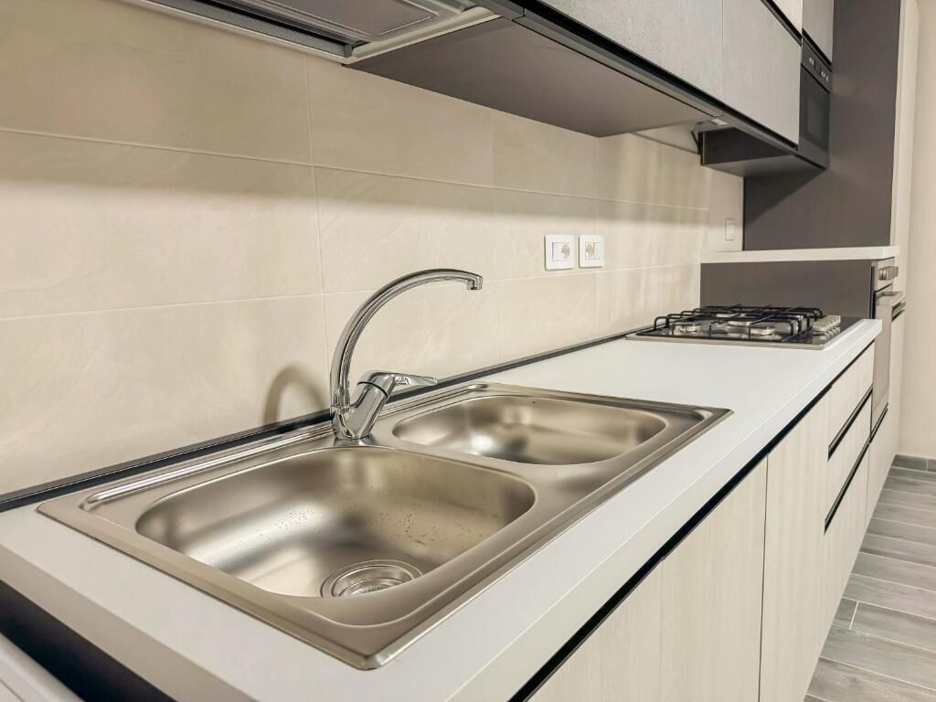 Appartamento, balcone | Area soggiorno | TV a schermo piatto