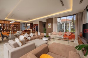 Luxury Villa, 4 Bedrooms, Private Pool, Resort View | Living room | 50-inch flat-screen TV with satellite channels, Netflix