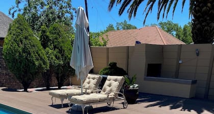 Spacious lodge in enchanting Welkom with WiFi, AC