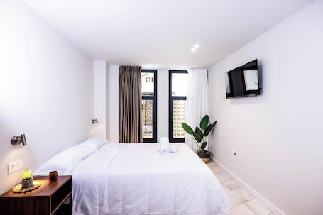 Sistema de insonorización, tabla de planchar con plancha y wifi gratis . Apartamentos Turísticos Insulae