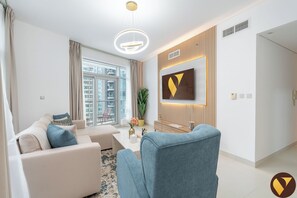 Departamento de lujo, vista a la ciudad | Área de sala de estar