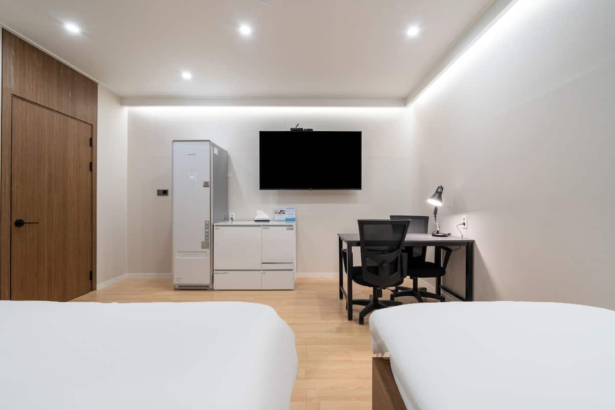 Chambre Deluxe avec lits jumeaux, salle de bains privée