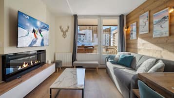 Luxury Apartment | Living area | 24-inch LCD TV with digital channels