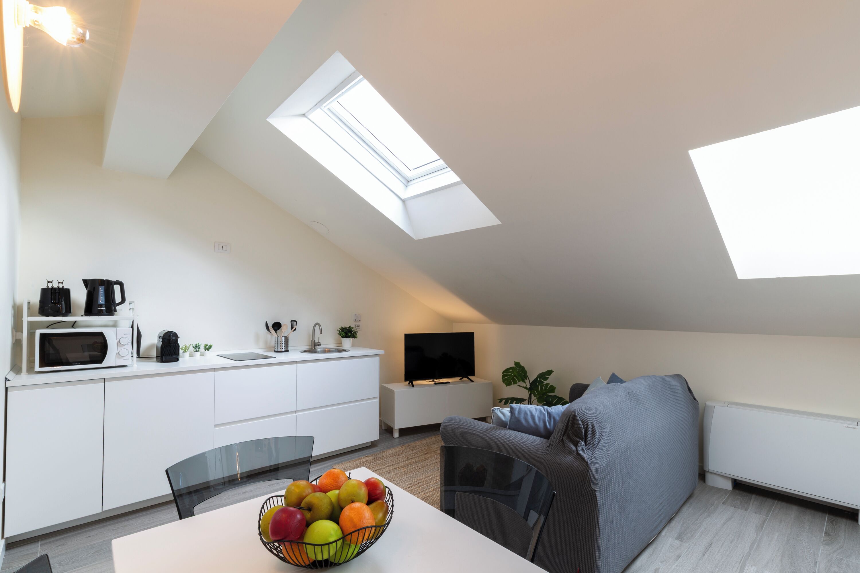 Deluxe-lejlighed | Opholdsområde | 40-tommers smart-tv med digitale kanaler